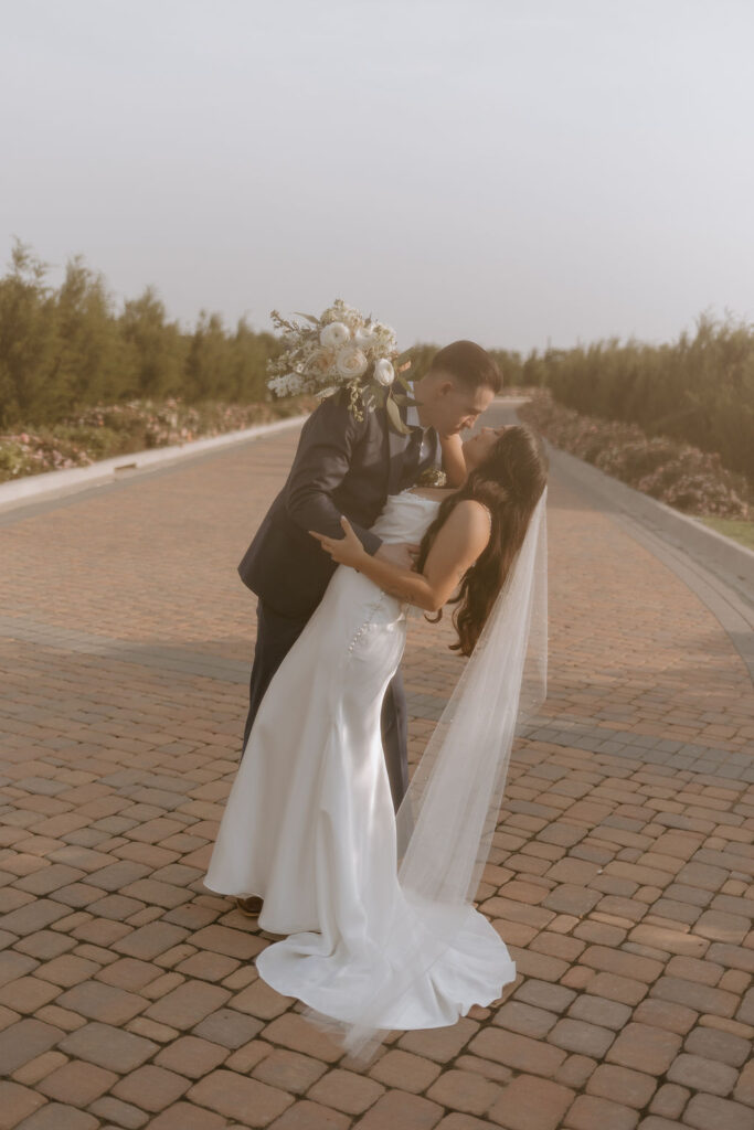 Bride and groom pose for their couples portraits