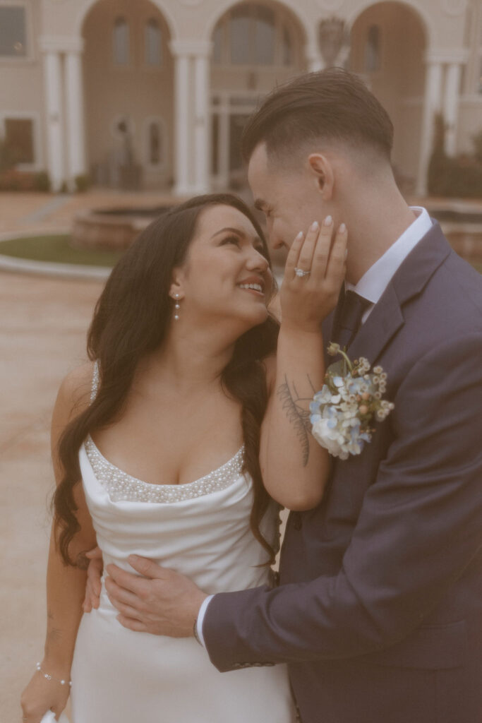 Bride and groom pose for their couples portraits