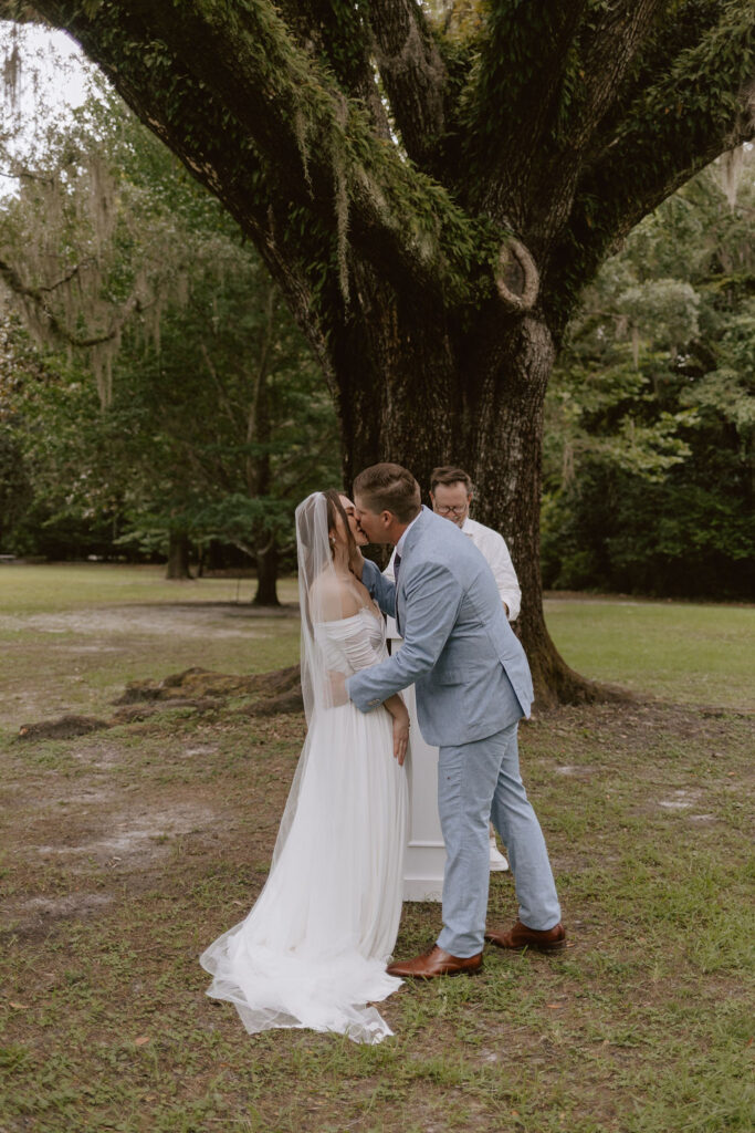 Bride and groom kiss during their Eden Gardens State Park elopement ceremony