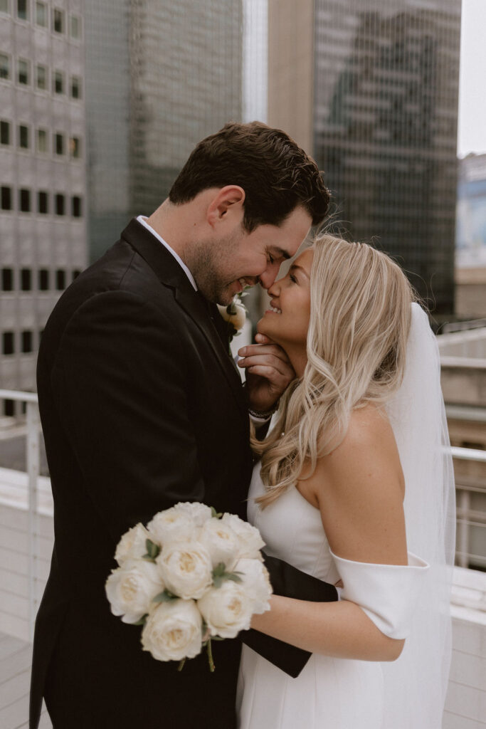 Bride and groom wedding portraits on a rooftop in Dallas, Texas