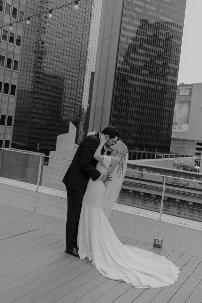 Bride and groom wedding portraits on a rooftop in Dallas, Texas