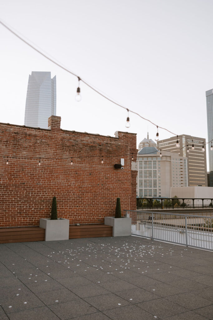 A rooftop surprise proposal setup in OKC