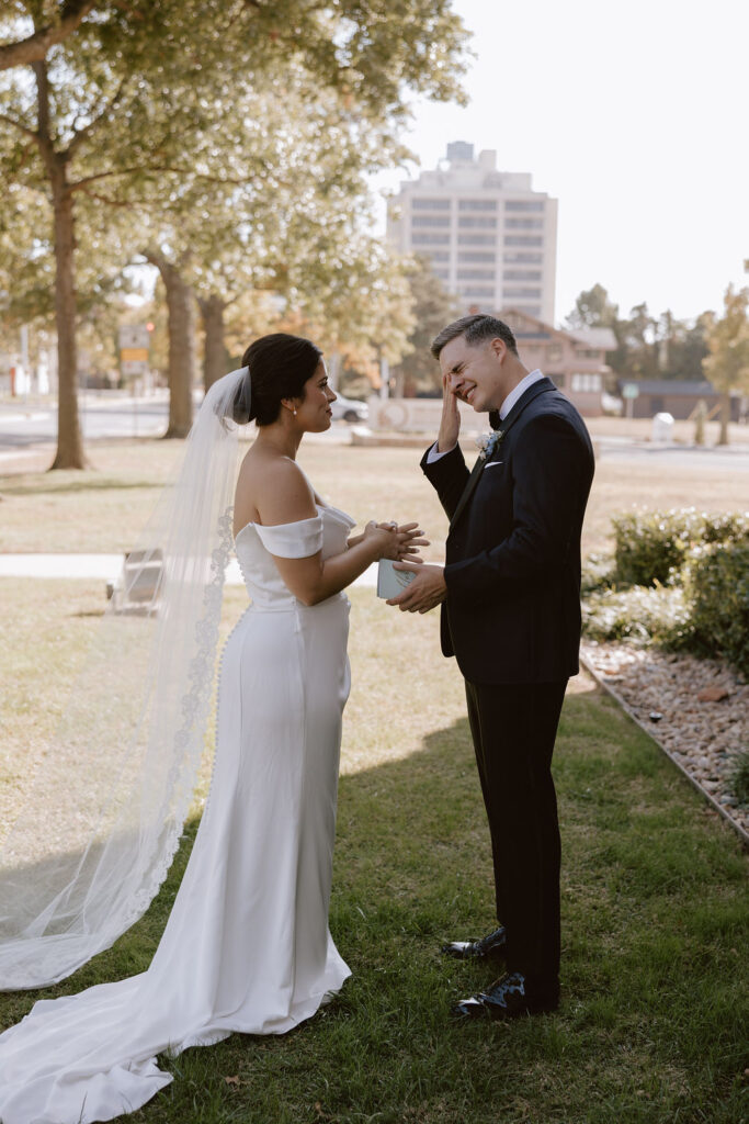 Bride and groom share their private vows outside the Oklahoma Hall of Fame