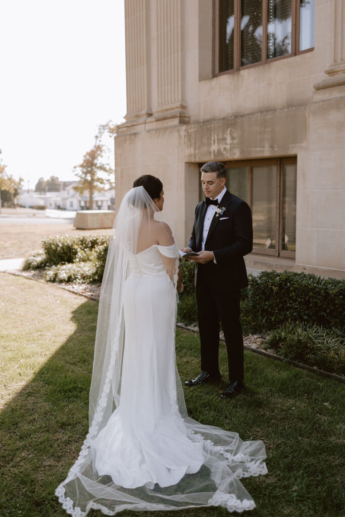 Bride and groom share their private vows outside the Oklahoma Hall of Fame