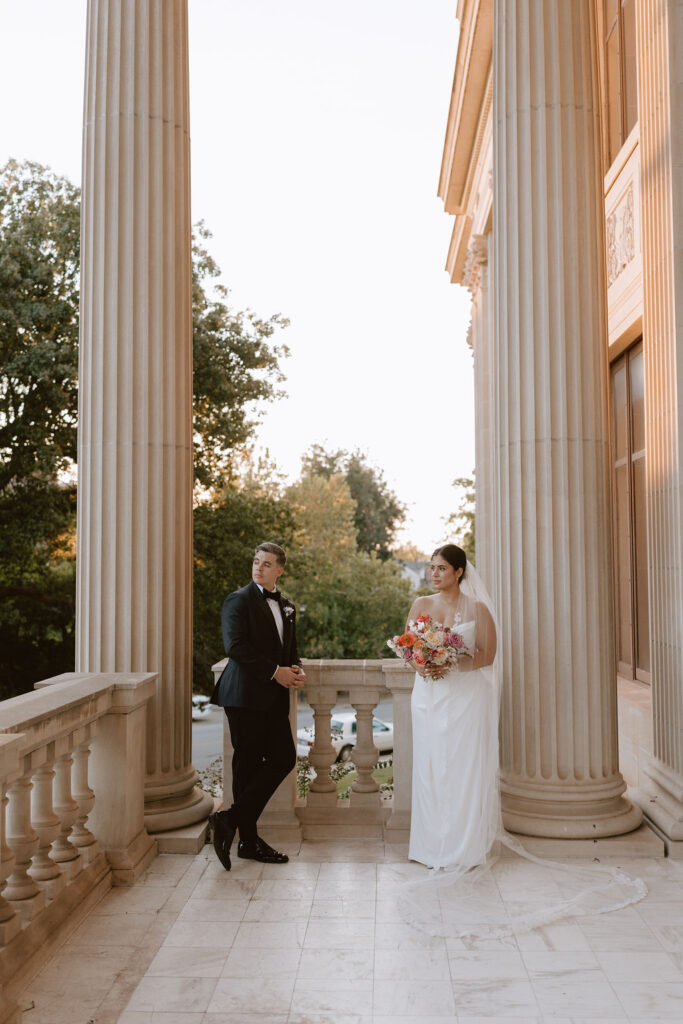 Bride and groom portraits on the front steps of Oklahoma Hall of Fame