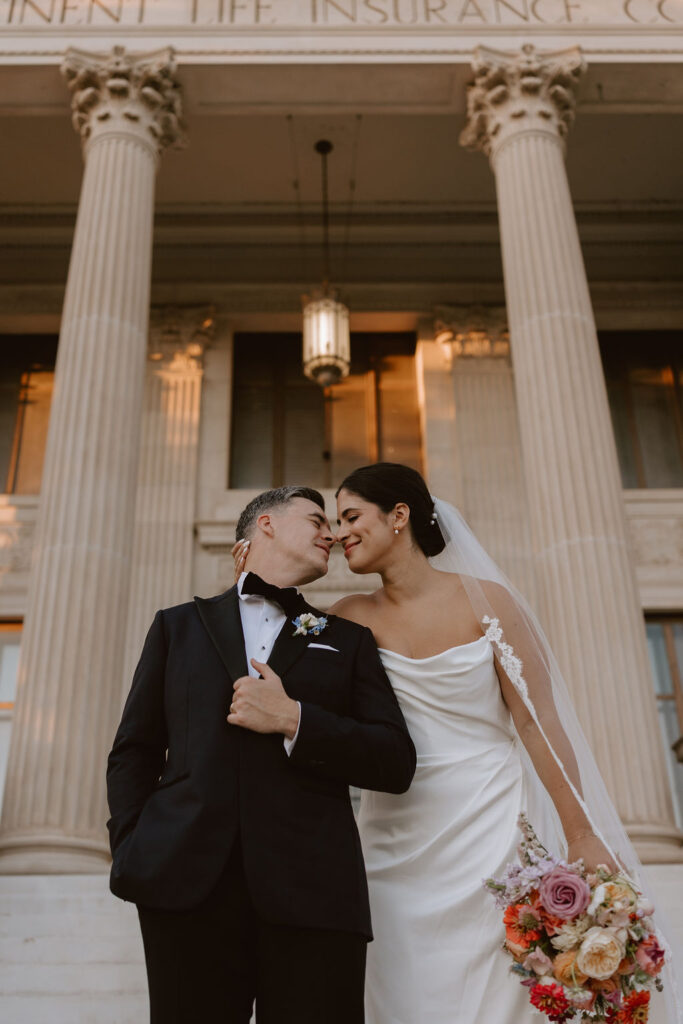 Bride and groom portraits on the front steps of Oklahoma Hall of Fame