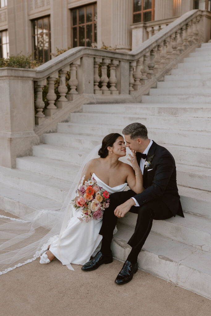 Bride and groom portraits on the front steps of Oklahoma Hall of Fame