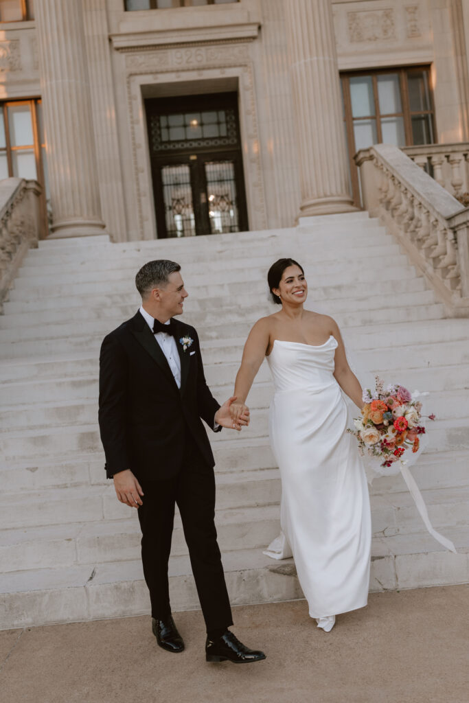 Bride and groom portraits on the front steps of Oklahoma Hall of Fame