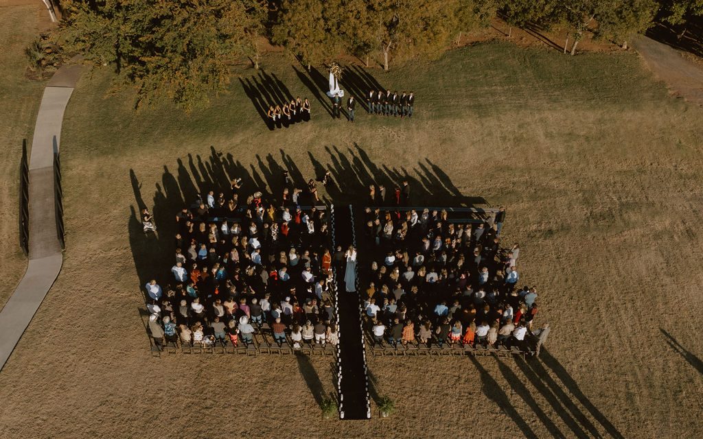 A drone shot of an emotional Sorelle wedding ceremony in Oklahoma