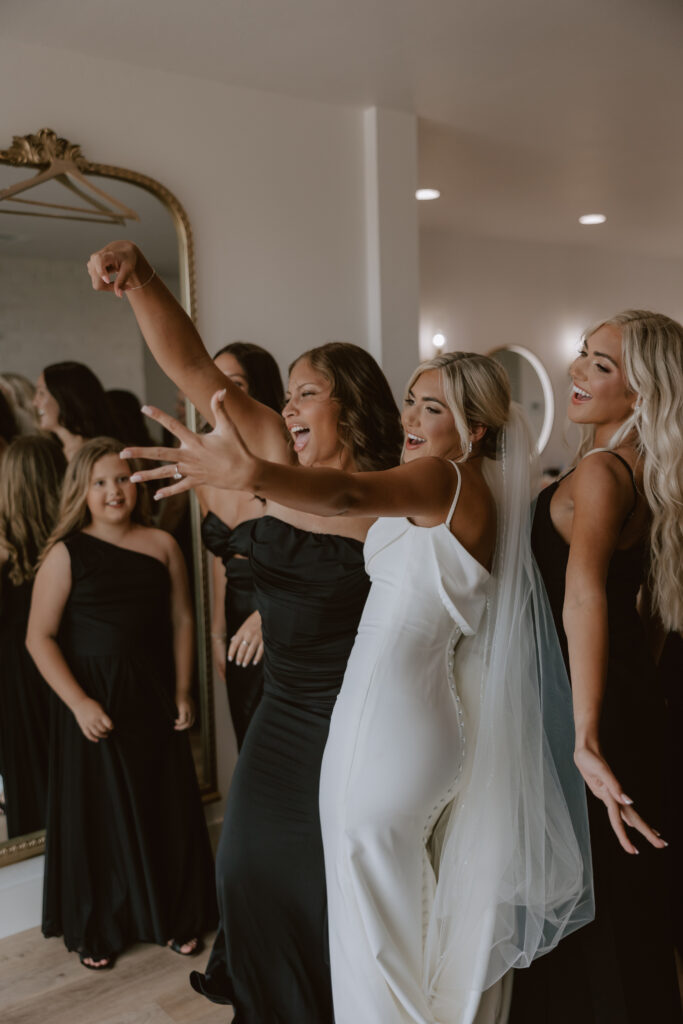 Documentary wedding photography of bride and bridesmaids