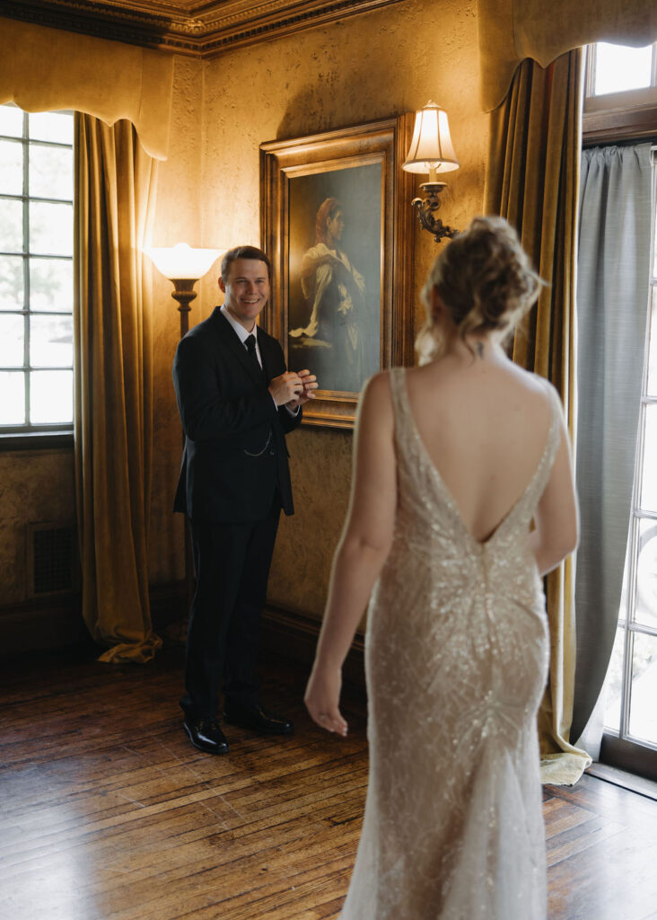 Bride and groom first look inside Dresser Mansion