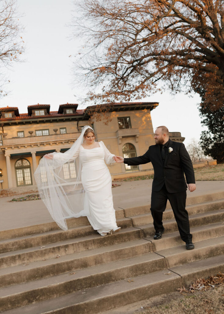 Bride and groom portraits outside of The Mansion at Woodward Park