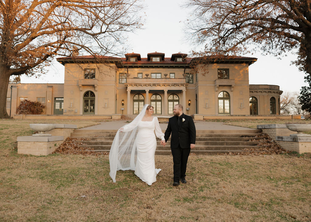 Bride and groom portraits outside of The Mansion at Woodward Park