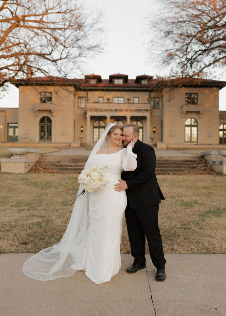 Bride and groom portraits outside of The Mansion at Woodward Park