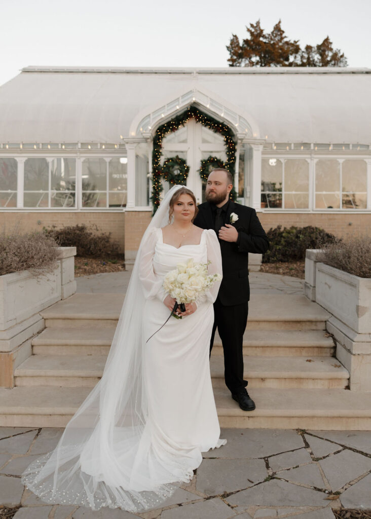 Bride and groom portraits outside of The Mansion at Woodward Park