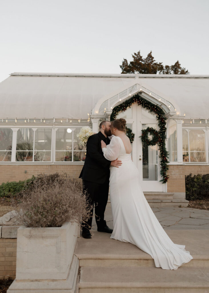Bride and groom portraits outside of The Mansion at Woodward Park