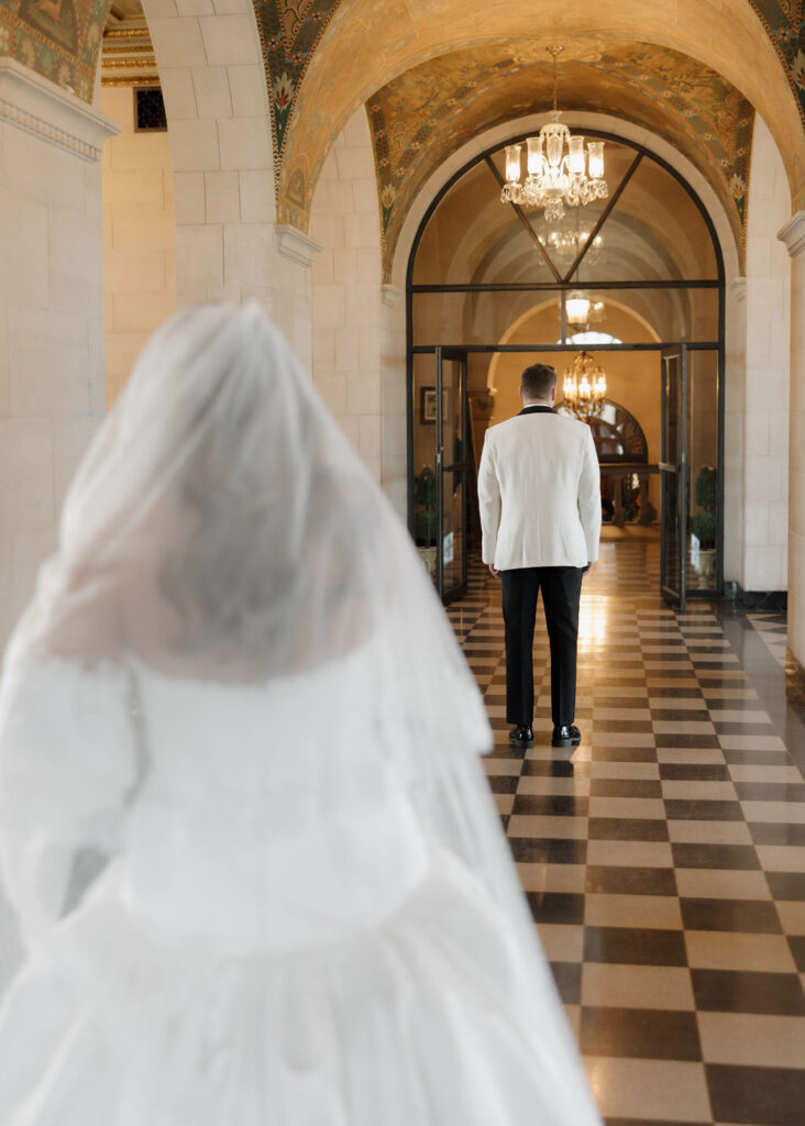 Bride and groom first look inside of Marland Mansion