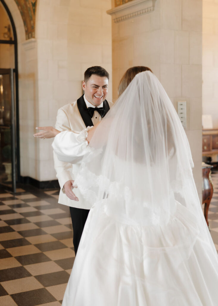 Bride and groom first look inside of Marland Mansion