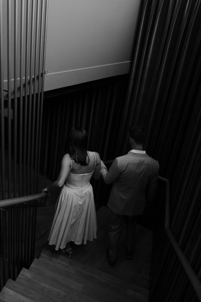 Moody, romantic engagement photos in Dallas at a speakeasy