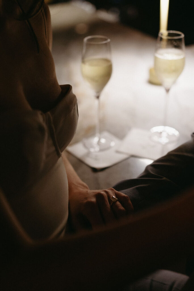 Moody, romantic engagement photos in Dallas at a speakeasy
