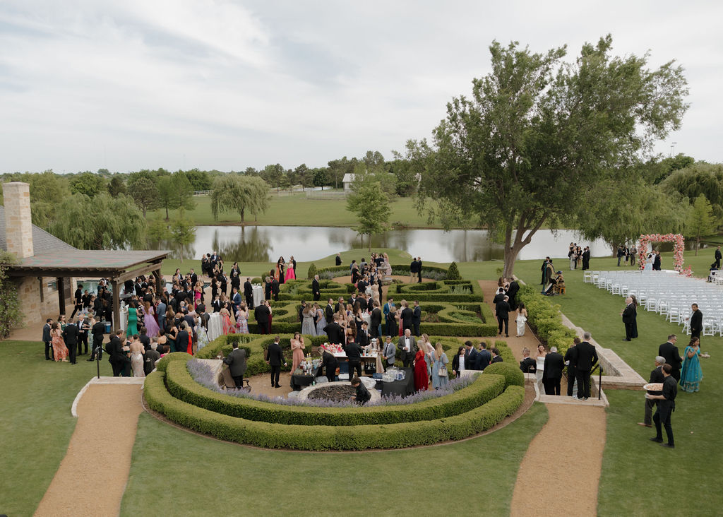 Guests gather in the garden at The Bower Venue