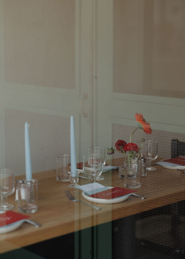 Baby blue and red reception table settings