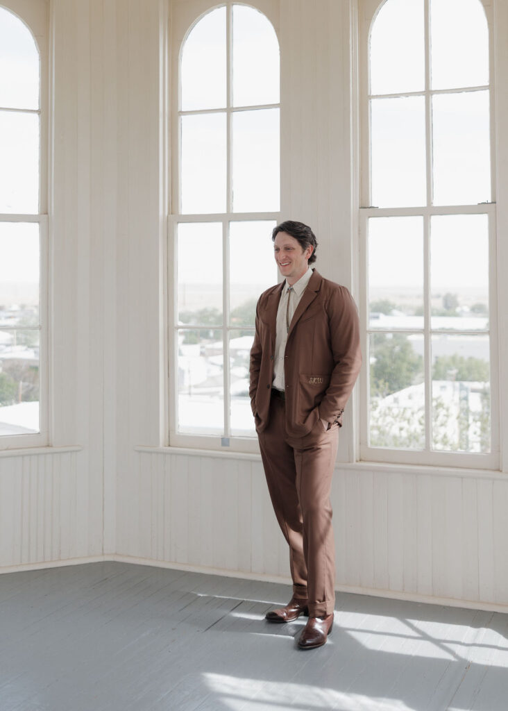 Texas micro wedding first look in Marfa Courthouse tower
