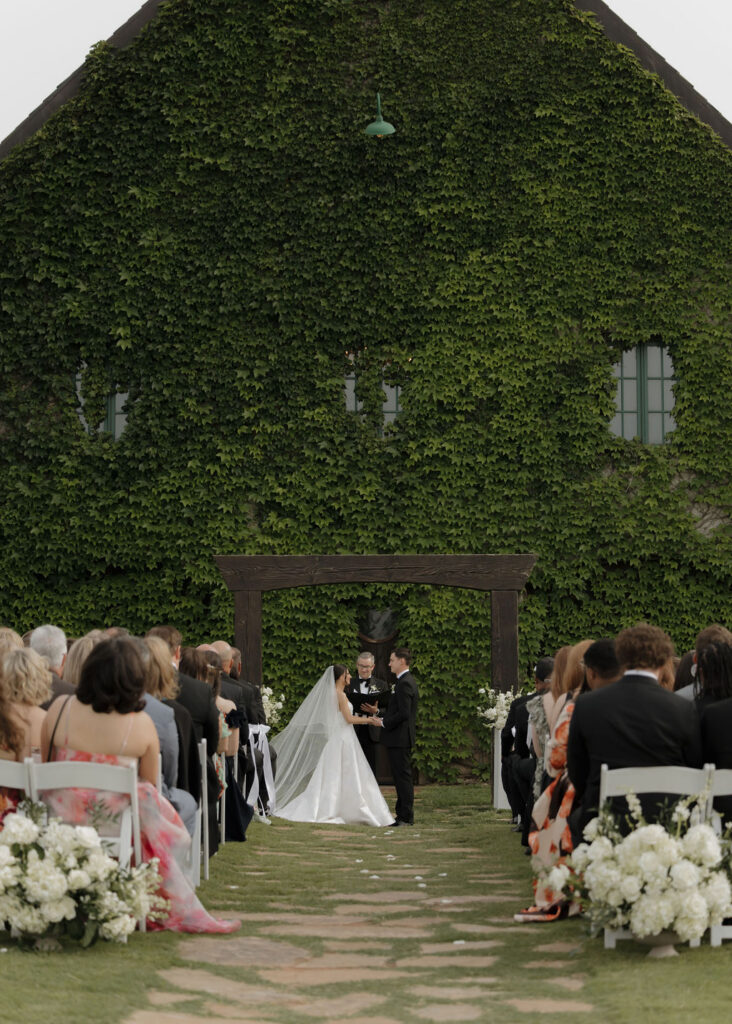 Wedding ceremony outside of The Baumberhof in Oklahoma